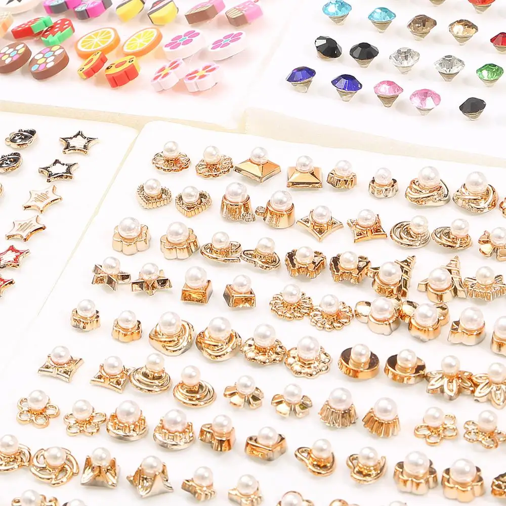 القادمون الجدد 100 زوج/حزمة اساليب متباينة حجر الراين ABS زهرة هندسية الحيوان أقراط مجموعة للنساء مجوهرات اكسسوارات