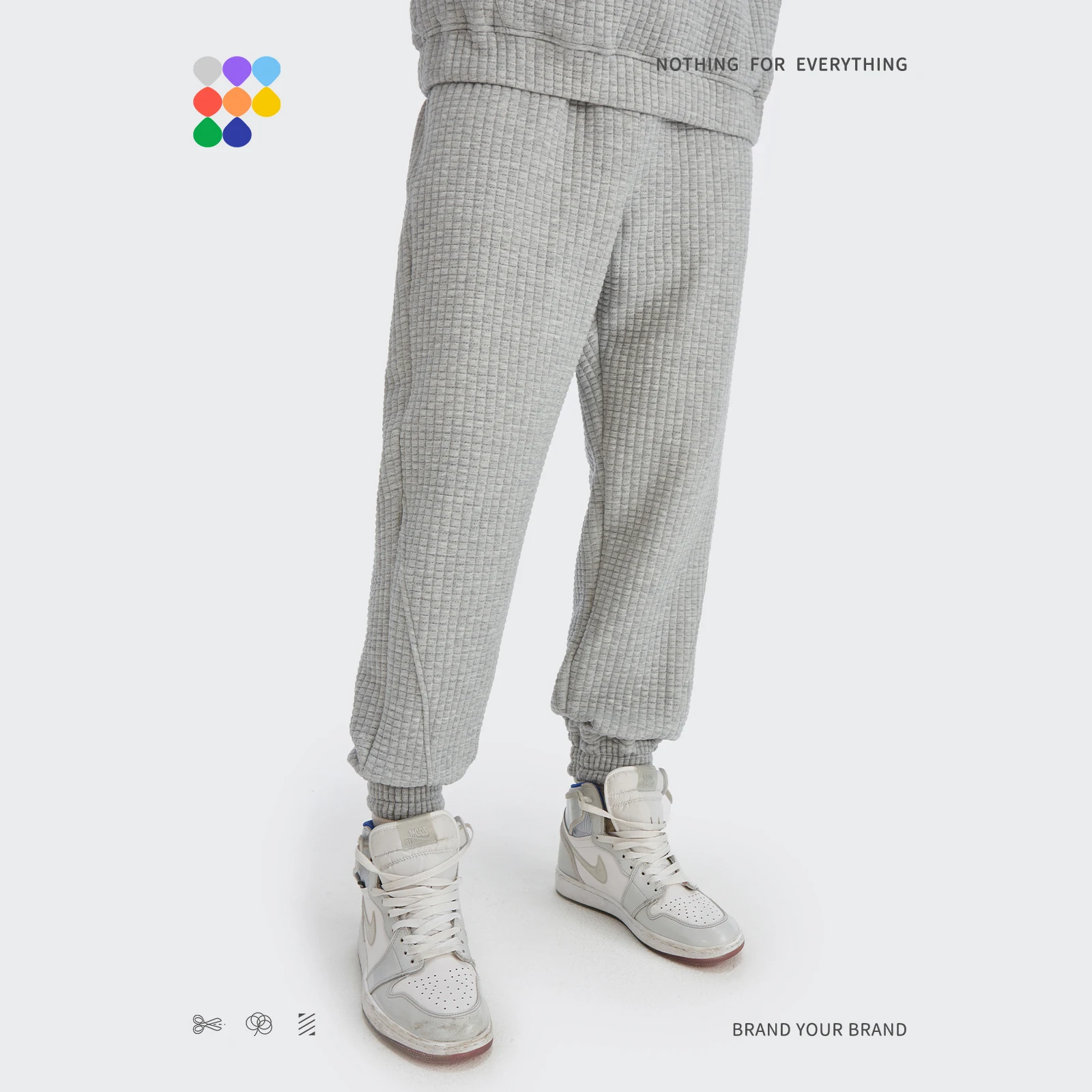 อัตราเงินเฟ้อฤดูหนาวหนาสบายๆกางเกงคู่แฟชั่นวาฟเฟิลถักกางเกงผู้ชายธรรมดา Joggers กางเกงกางเกงผู้หญิง