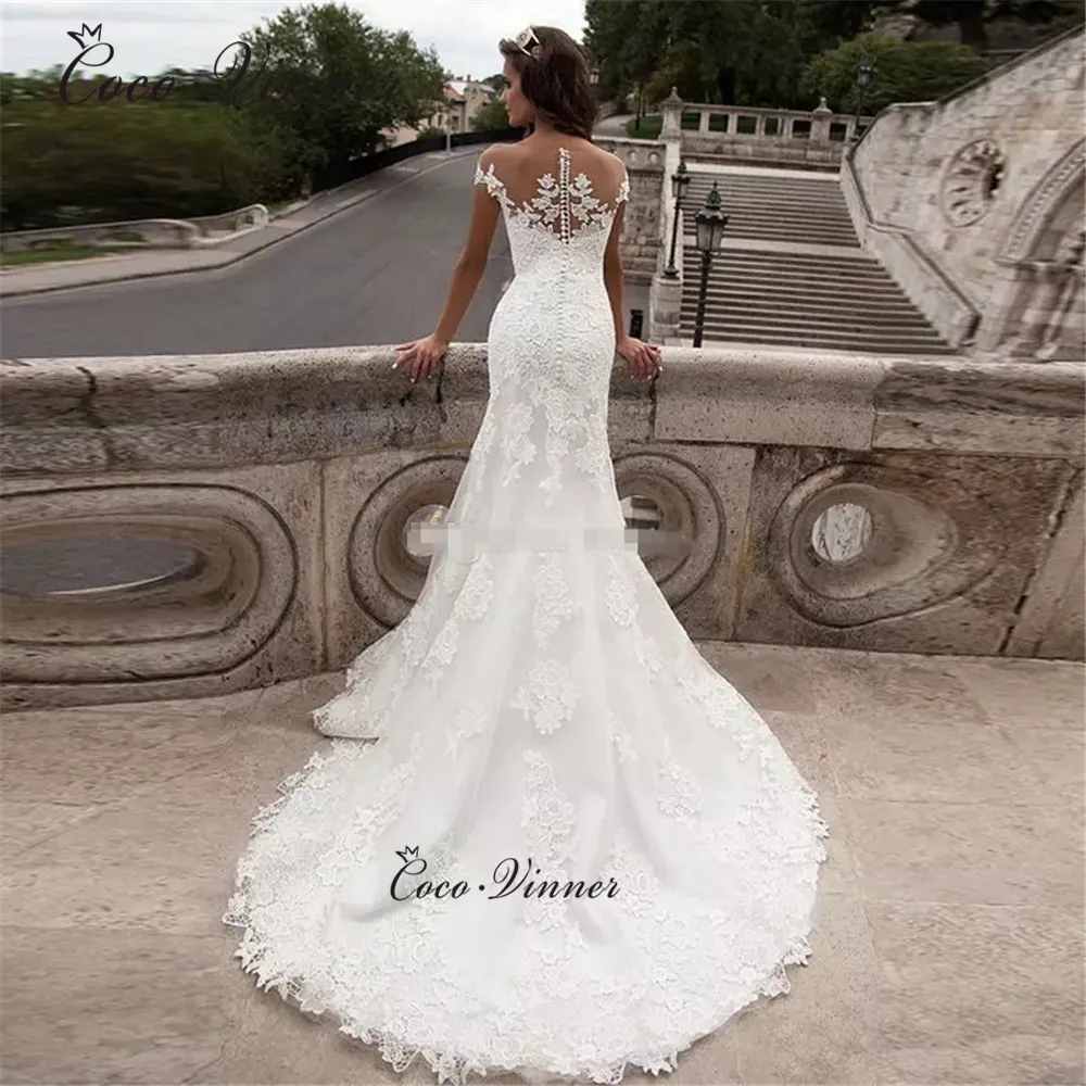 Abiti da sposa a sirena con maniche ad aletta personalizzate Appliques 2025 Illusion Lace Button Back Vestido Novia Negro Abiti da sposa W0545