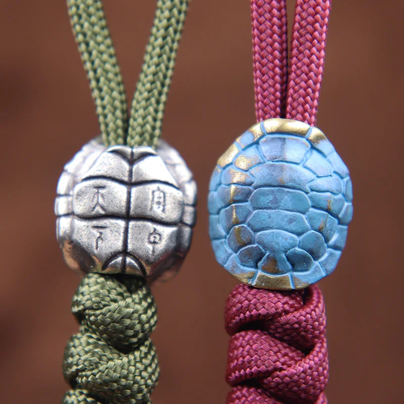 Rame longevità tartaruga conchiglia lettere coltello perline intrecciato Paracord cordino ciondolo gioielli fortunato fai da te EDC strumento Charms