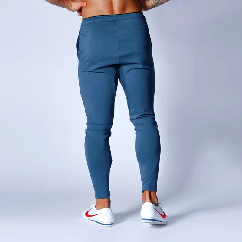 Japan & UK 2020 New SKY BLUE Zipper Pocket Sport Running uomo Joggers Bodybuilding pantaloni sportivi pantaloni sportivi allenamento da palestra