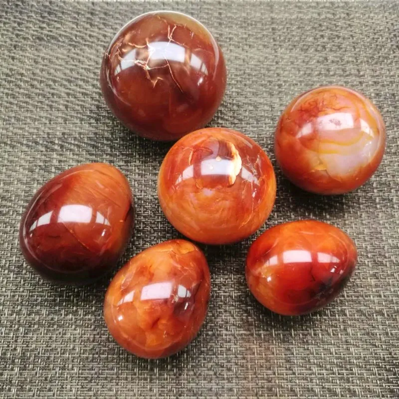 Red agate egg and crystal ball piedras naturales y minerales gemstones reiki healing stones feng shui decoracion hogar moderno