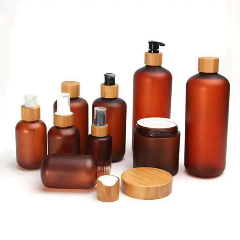 

Cosmetic Containers 60ml 120ml 250ml 500ml Frosted Amber Plastic PET Bottle with Bamboo Lid Beauty Skin Care Product Spray