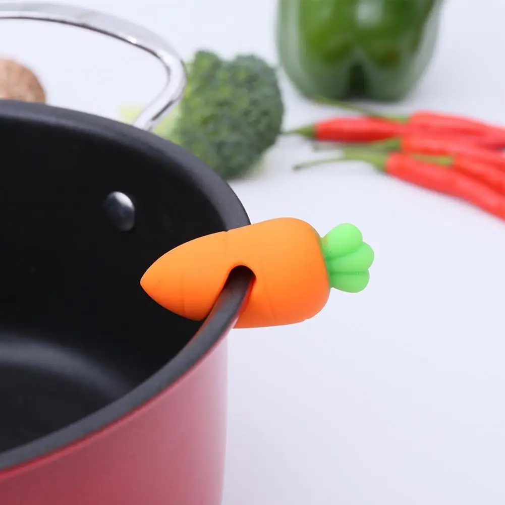 

Pot Lid Lifter Cartoon Pepper Spill Proof Lid Stand Overflow Prevent Carrot Shape Pot Lid Holder Clips for Pot Kitchen Supplies