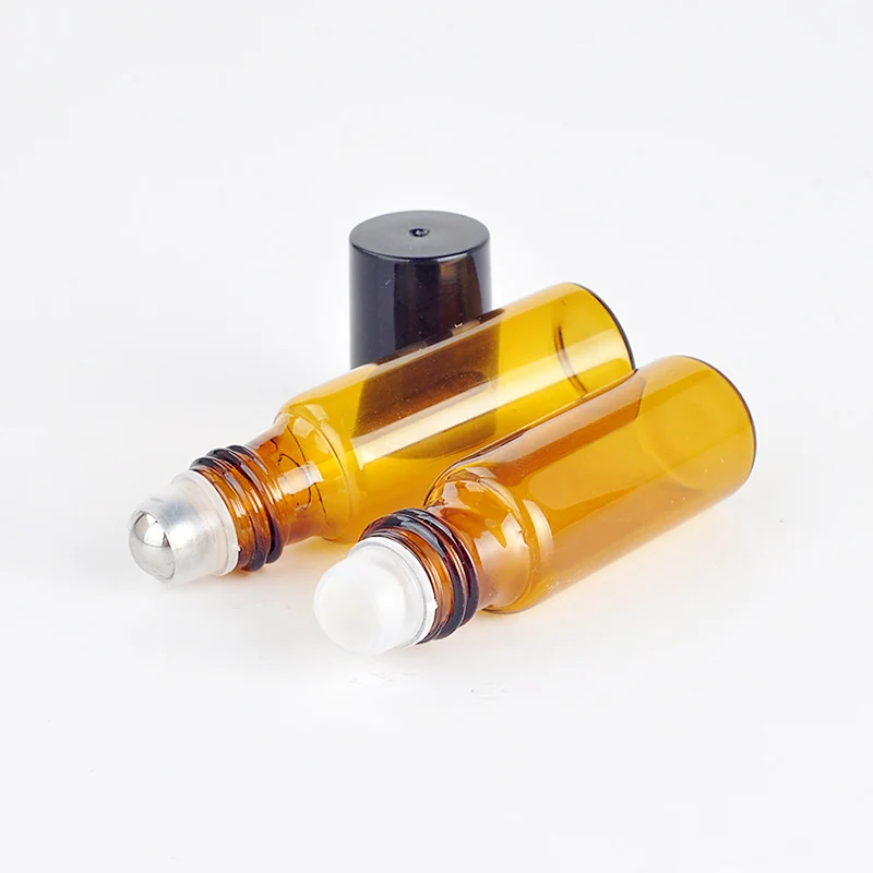 10 adet/100 adet/grup 5ml taşınabilir Amber cam rulo Rollerball uçucu yağ şişeleri doldurulabilir parfüm şişesi kozmetik konteyner