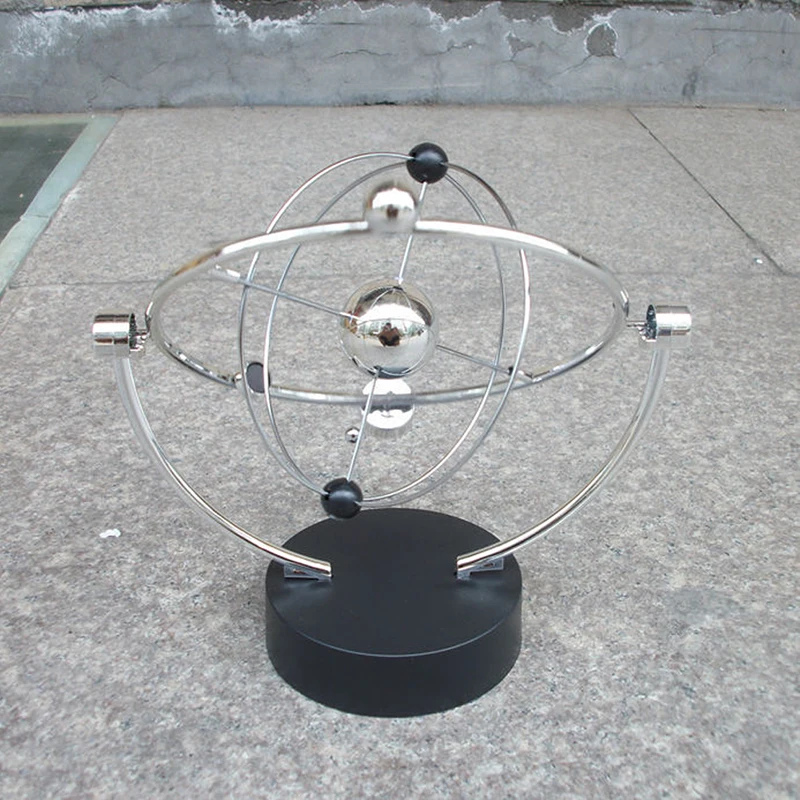 1 ชิ้น Kinetic Art! โทรศัพท์มือถือ Milky WAY Gizmos Perpetual Motion ทรงกลมลูกตุ้มหมุนโต๊ะ Orbital ของเล่น