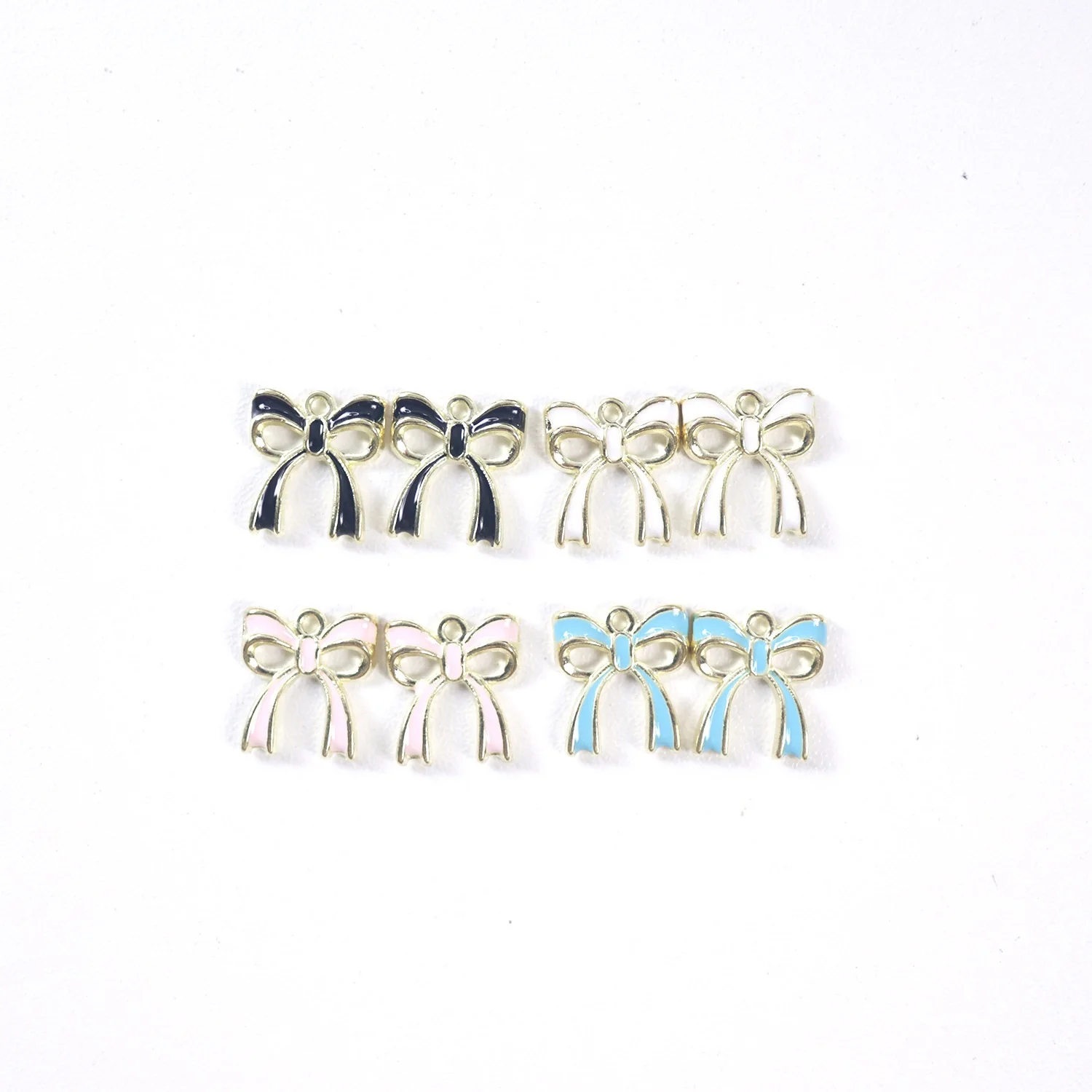 100pcs 13*15mm cute double bow alloy jewelry tag Rubber band earrings Drop oil jewelry accessories