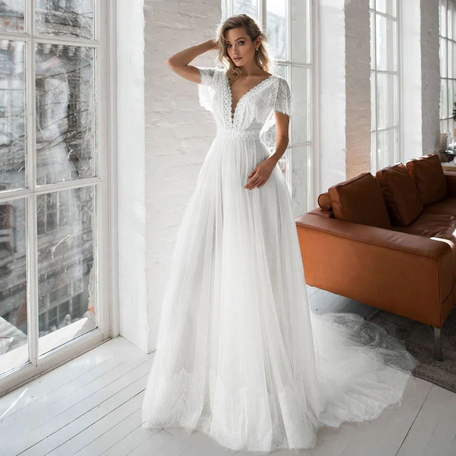 Robe de mariée en dentelle avec col en V profond, tulle à pois, sur mesure, manches courtes flottantes, coupe basse, dos nu, plage, robe de patients princesse Boho