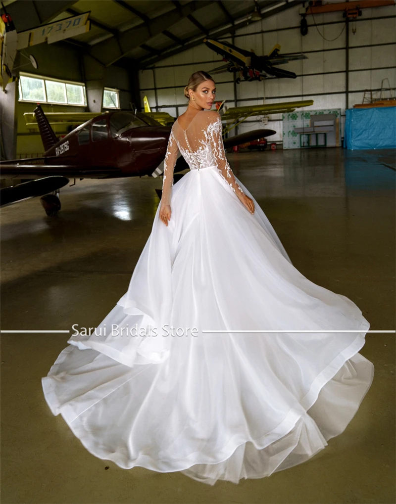 Customized Sheer Neck with Heavy Crystals Long Sleeves White Wedding Dress Organza and Tulle A-line Bling Bridal Dress
