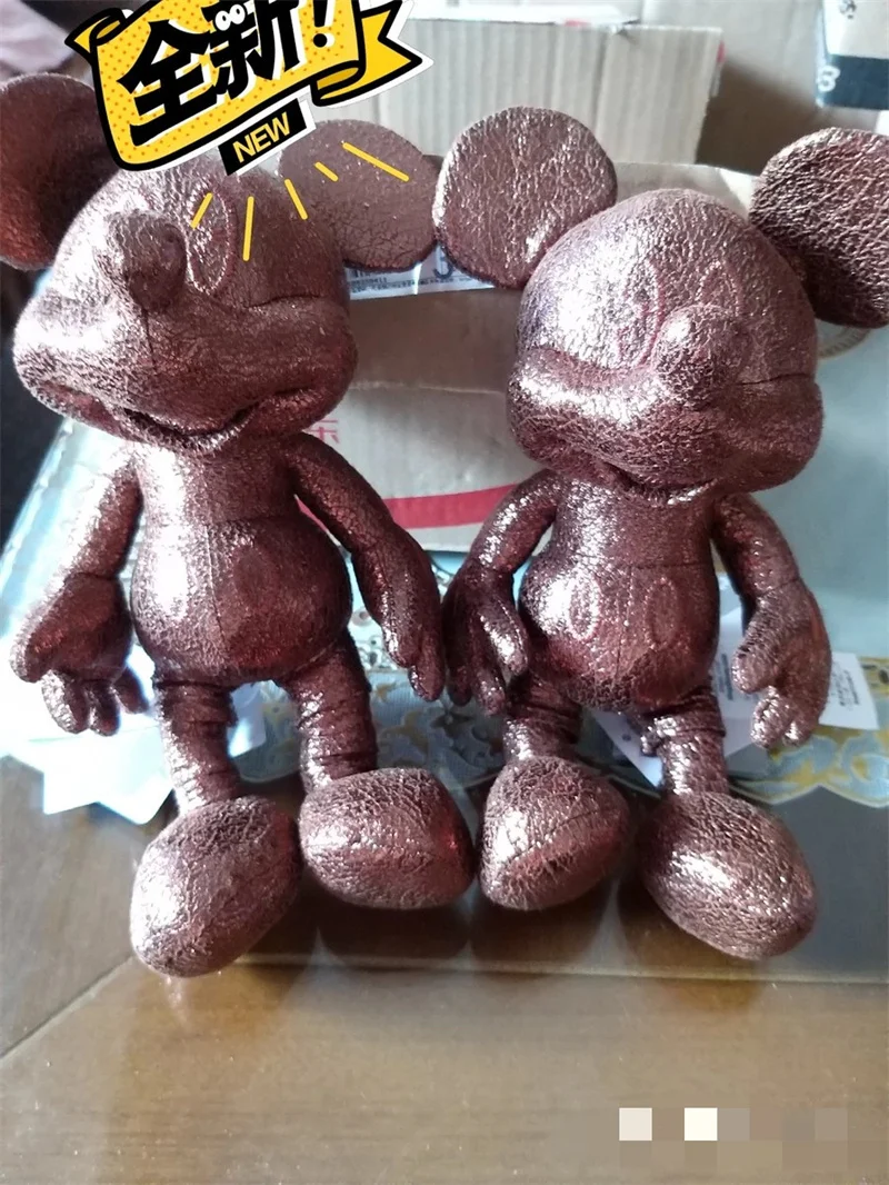 

Original Disney commemorative golden Mickey toy with tag Creative chocolate mickey Bronzed Mickey Doll Toys for children