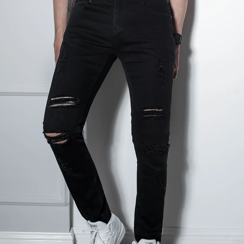 

European and American high street style jeans male teenagers more hole trousers knee destruction pants Slim stretch feet pants