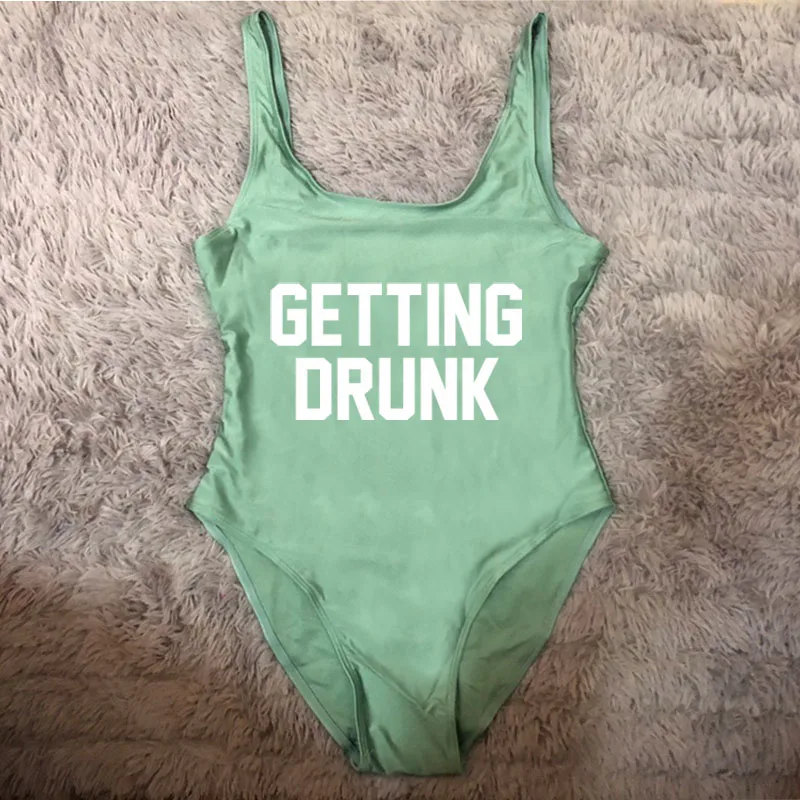 

GETTING DRUNK White Letter Swimwear Women One Piece Swimsuit Summer Bathing Suit Sexy Bodysuit 2021 Beachwear monokini Bikini