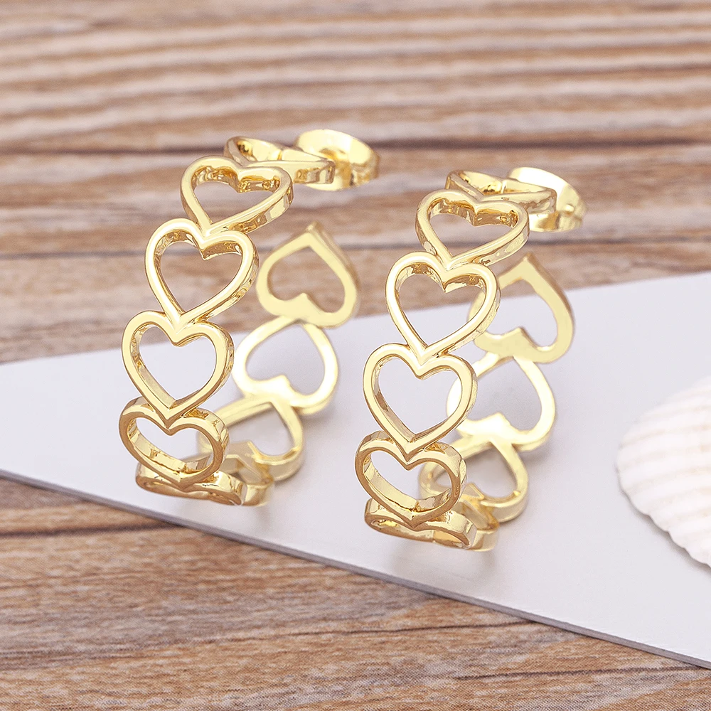 Nueva moda tendencia de las mujeres de cobre de Color oro amor corazón pendientes de argolla tipo Punk cena declaración accesorios de la joyería de regalo