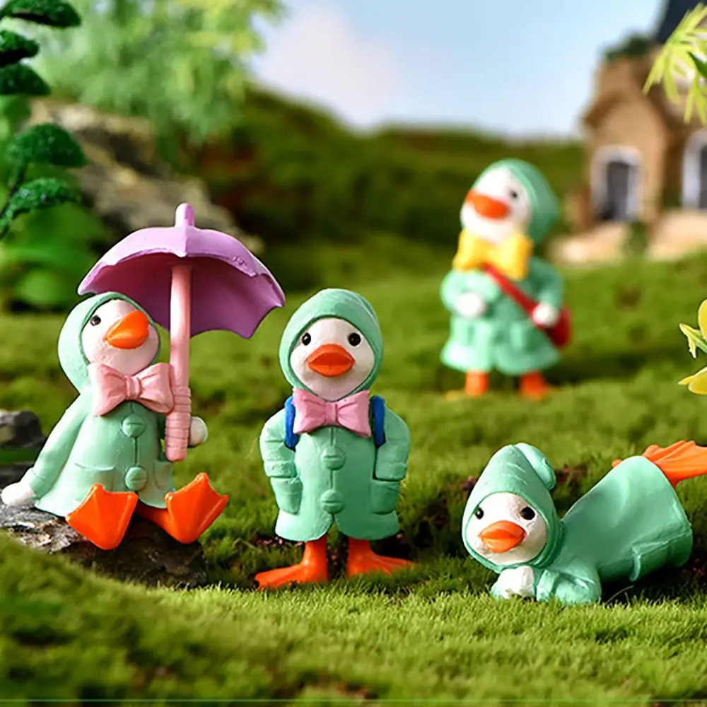 4pcs/set Cute Cartoon Umbrella Raincoat Duck Miniature Figurine Yellow Ducklings Figurine Micro Landscape Fairy Garden Ornaments