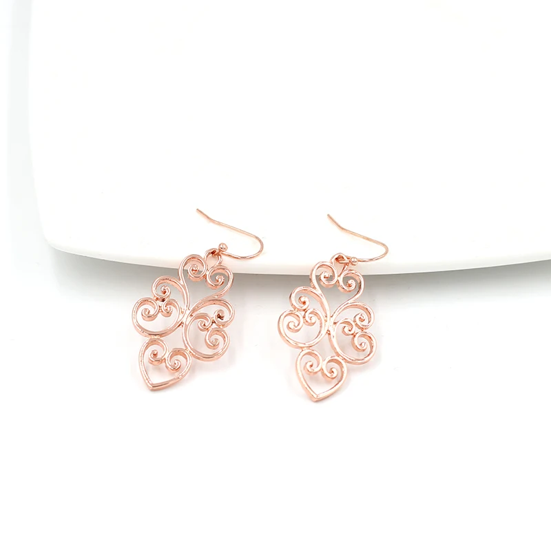 Boucle d'oreille goutte de fleurs creuses pour femmes et filles, cadeau de la fête de Léon, nouveaux bijoux de mode, cadeaux de Noël, hiver