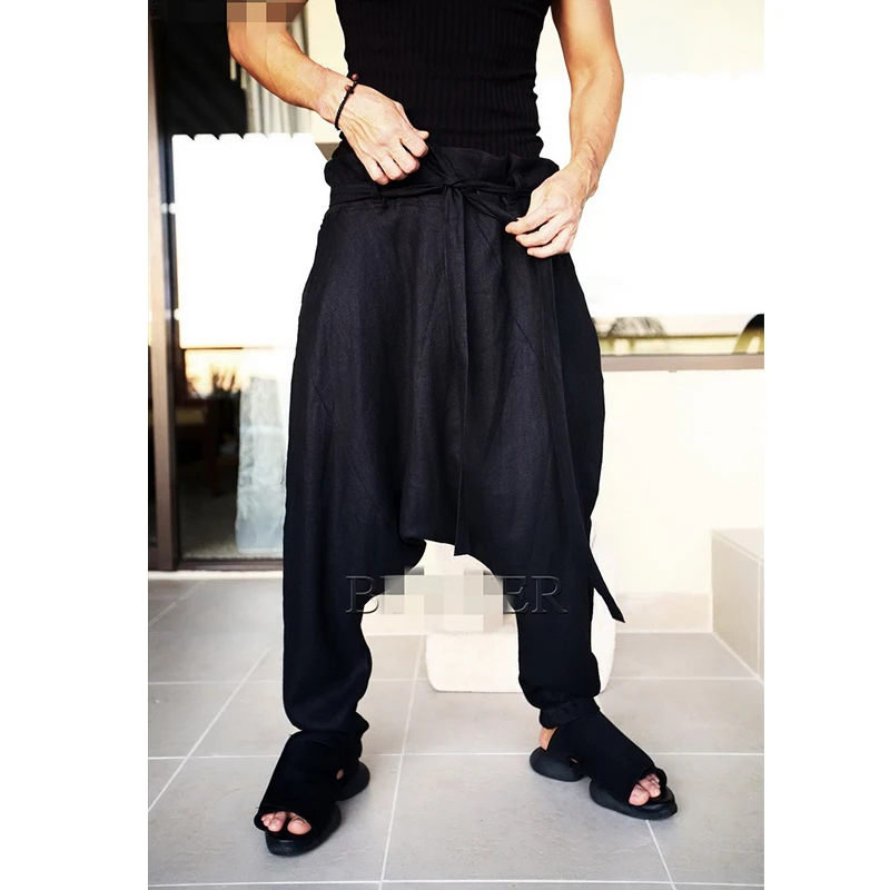 Korean youth hip hop men\'s low crotch fashion trend lace up casual pants Harem Pants linen pants loose personality