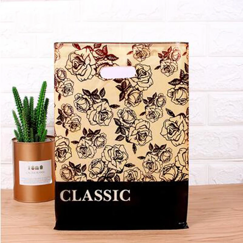 50PCS 15CM*20CM Small cartoon pattern lace pattern plastic gift wrapping bag handbag