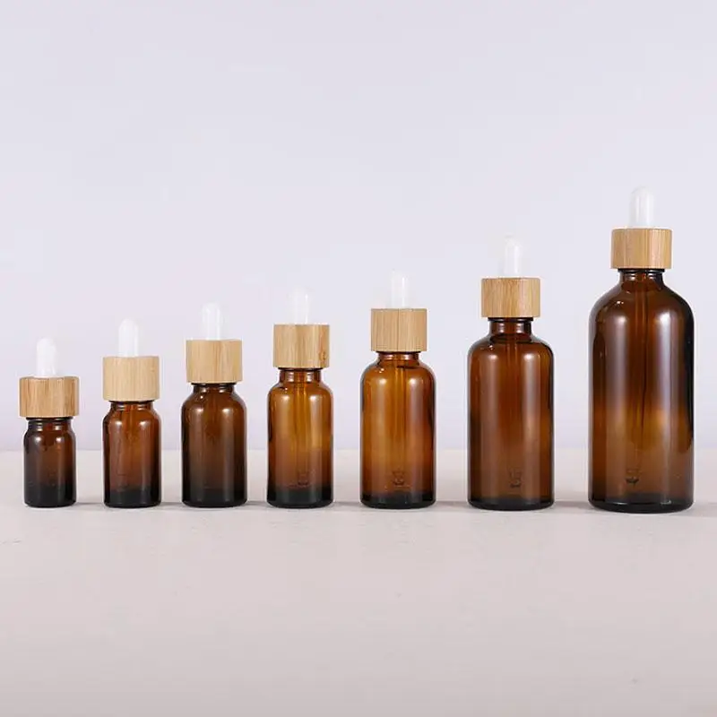 

5ml 10ml 15ml 20ml 30ml 50ml 100ml Amber Glass Essential Oil Cosmetic Dropper Bottles With Eye Dropper And Bamboo Cap