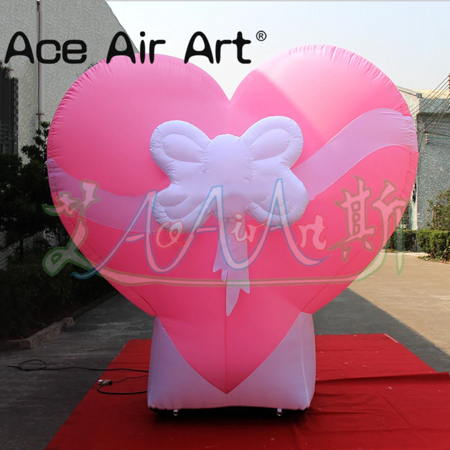 Corazón rosa inflable directamente de fábrica con lazo, regalo del Día de San Valentín para decoración de fiesta al aire libre, hecho por Ace Air Art