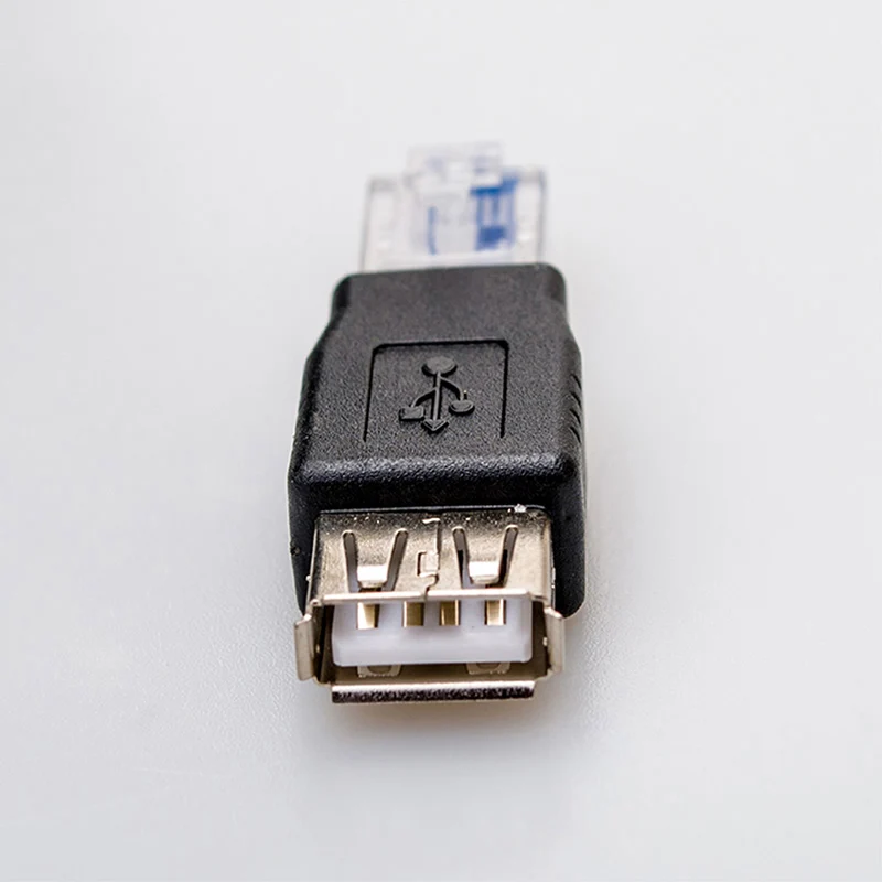 RJ45 maschio a USB femmina adattatore Ethernet connettore spina presa LAN Router di rete C3R5