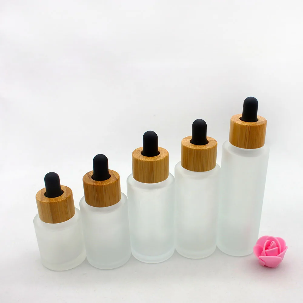 

Bamboo Lid cosmetic container 30ml 50ml 100ml 120ml 150m frosted glass bottle with bamboo lid travel bottle set