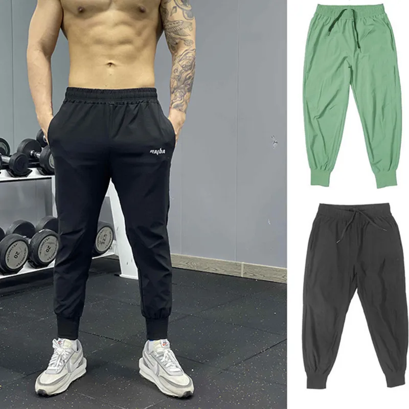 

Men's Sports Pants Fitness Tights Sweat Absorption Solid color Jogging Pants Men Sports Running Pants quick-drying Sweatpant