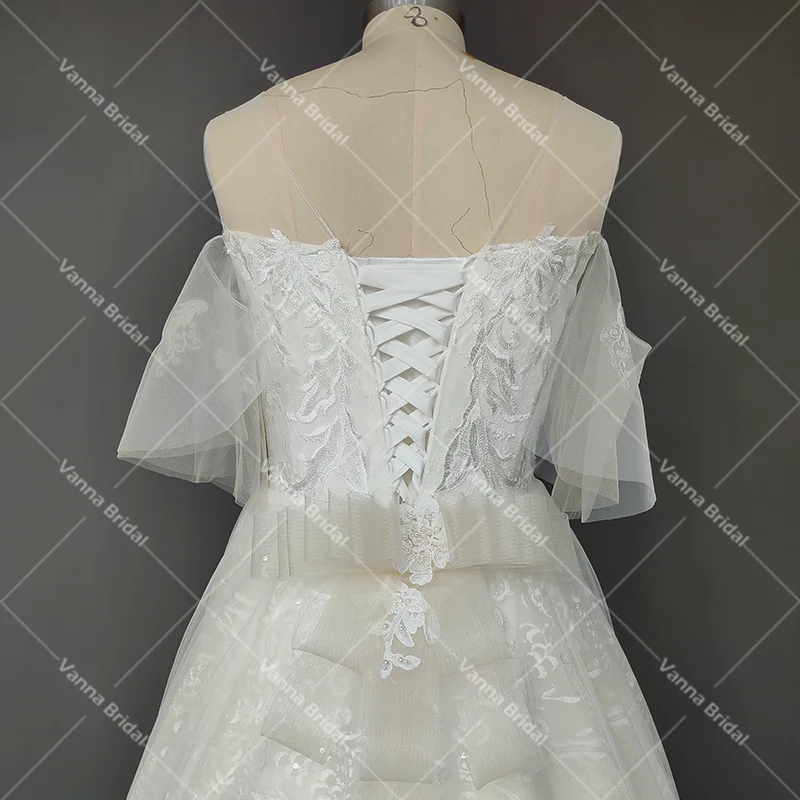 Prawdziwe zdjęcie luksusowe aplikacje kwiatowe szerokie rękawy suknia ślubna z wycięciem zimne ramię Bling Lace Up Cathedral Wedding Dress