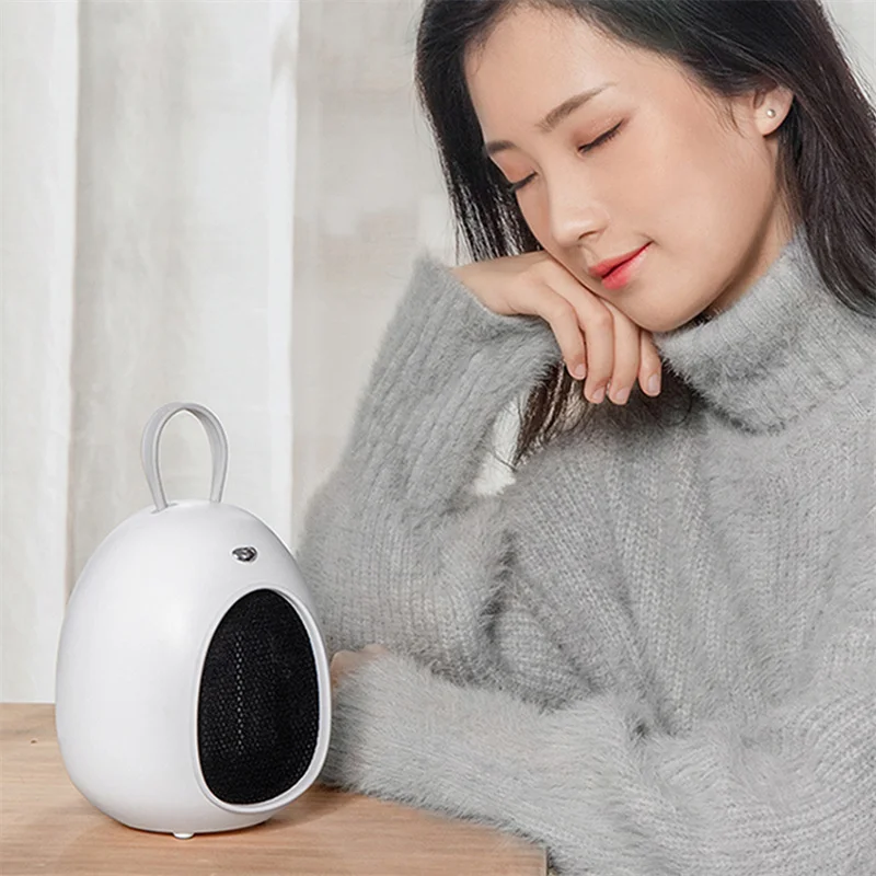 ポータブル電気ファンヒーター,セラミックヒーター,ウォームスタンド,ミニオフィス用,ユニークなデザイン,qn26