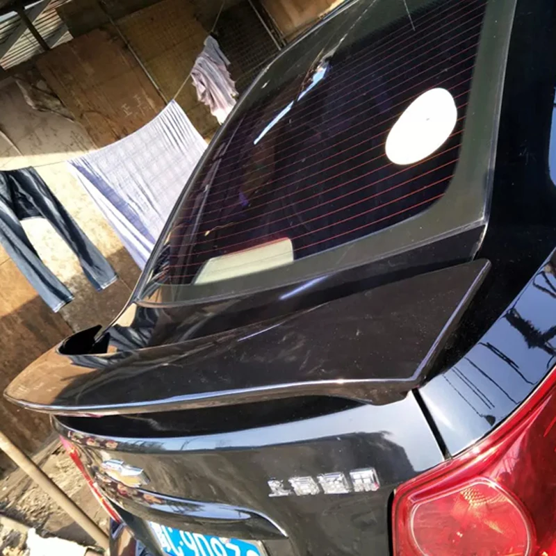 For Aveo Spoiler ABS Material Car Rear Wing Primer Color Rear Spoiler Press the tail For Chevrolet Aveo Spoiler 2010-2015