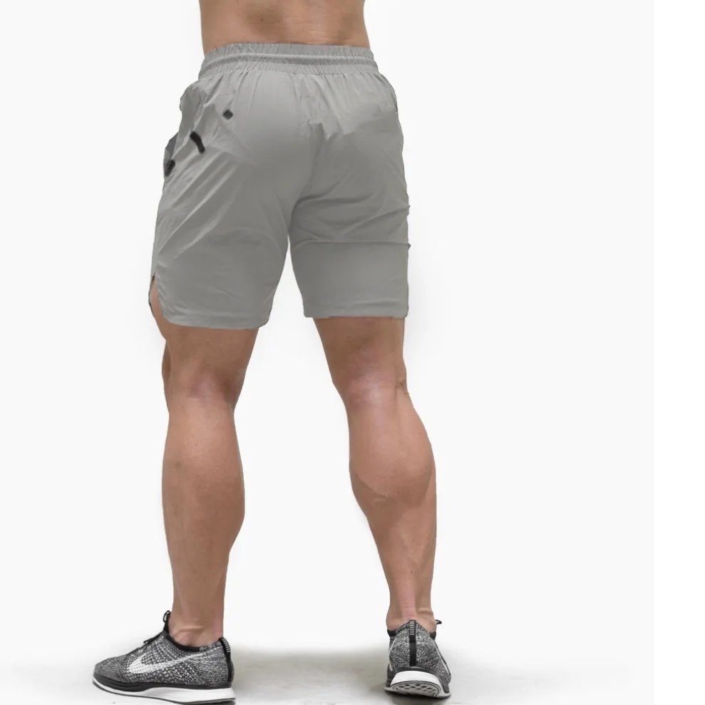 Fitness training running pants men's Muscle Men's casual, ventilating and quick drying pants fit shorts