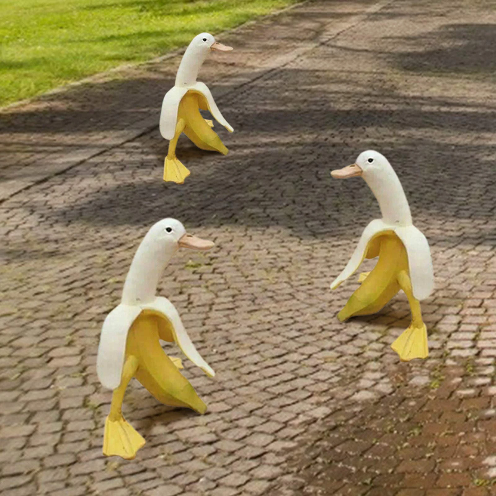 Statua di arte di anatra di Banana, arredamento esterno da giardino, simpatici ornamenti di decorazione di figurine di anatra di Banana pelati divertenti divertenti