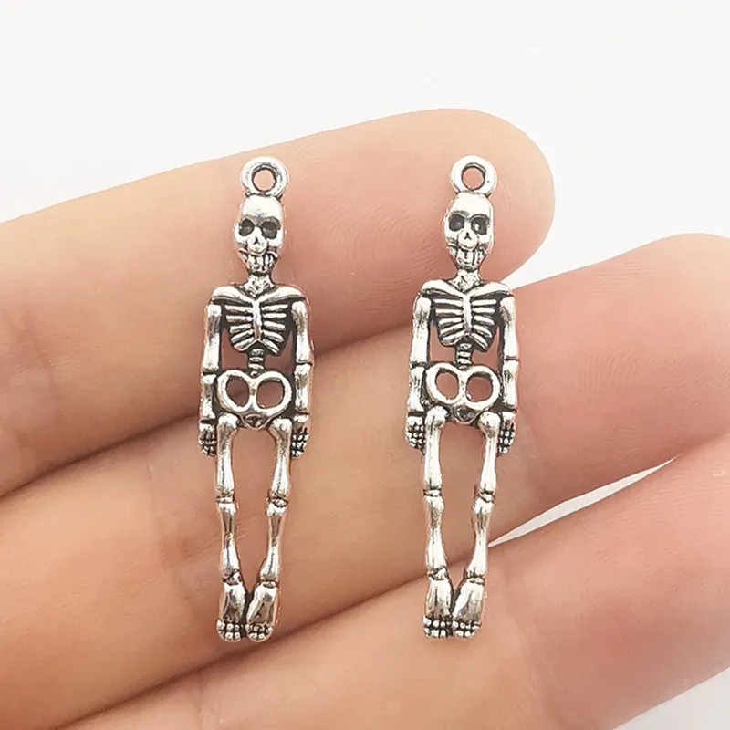 JINDINSP 12pcs Charms Skull Skeleton Man 39x9mm Antique Silver Color Plated Pendants Making DIY Handmade Tibetan Finding Jewelry