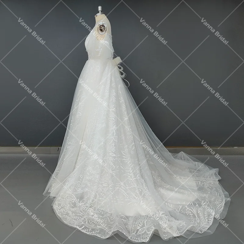 Prawdziwe zdjęcie luksusowe aplikacje kwiatowe szerokie rękawy suknia ślubna z wycięciem zimne ramię Bling Lace Up Cathedral Wedding Dress