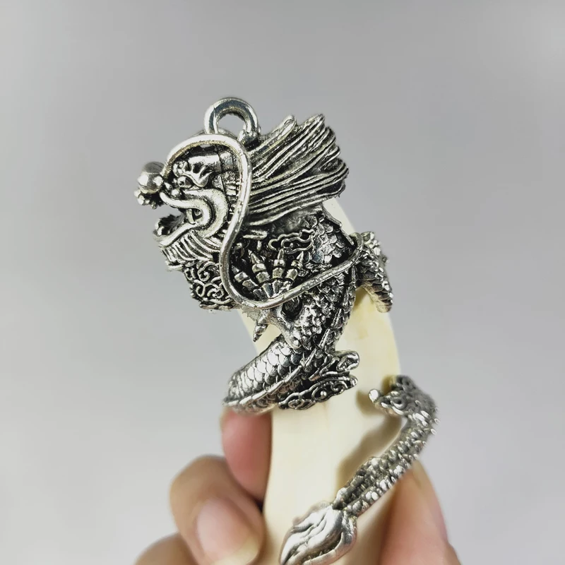 Elaborate Natural Chinese Collectible Handwork Tibetan Silver Dragon Statue Inlaid with Wild Boar Teeth Auspicious Pendant