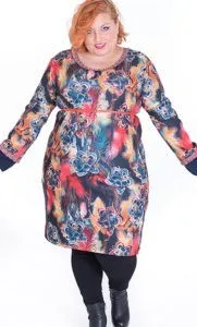 Dress of young woman with flower print, line A. Long-sleeved, comfortable and elastic neoprene fabric