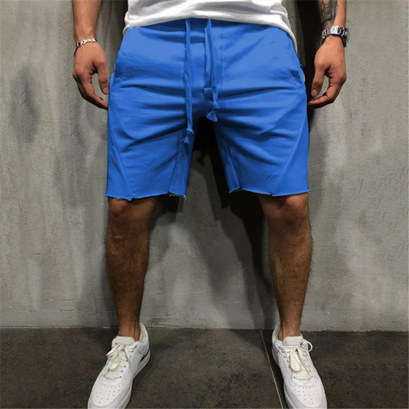 Pantalones cortos de estilo salvaje para hombre, pantalones cortos rasgados de Color sólido, pantalones cortos de entrenamiento para correr