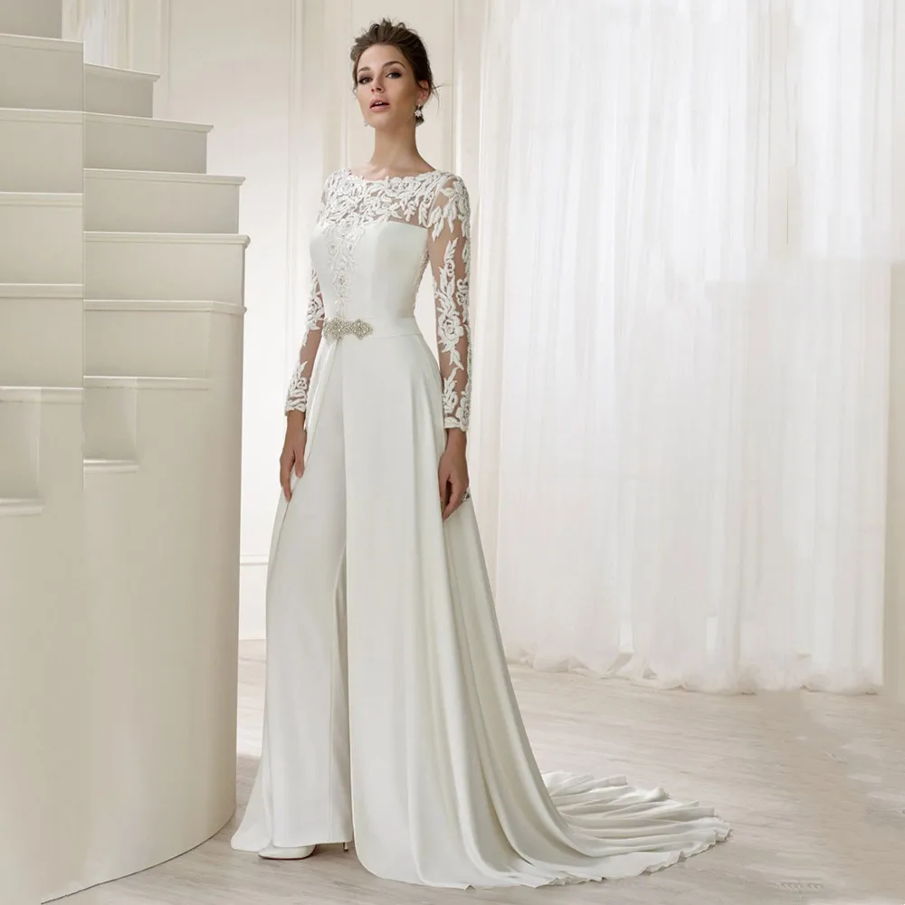 Abiti da sposa in pizzo con tuta con strascico staccabile maniche lunghe o-collo abiti da sposa formali in rilievo abiti da sposa personalizzati