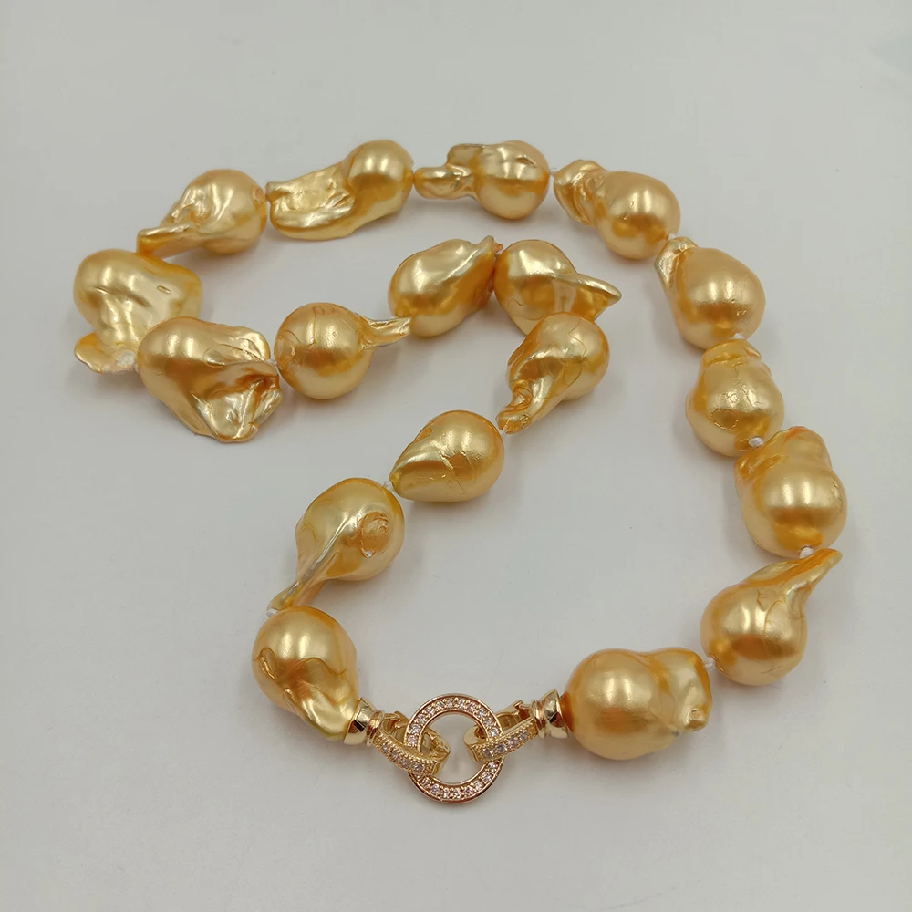 100%  FRESHWATER Baroque PEARL NECKLACE-good quality-pearl color is gold painted can\'t fade,brass good clasp 18k gold plating