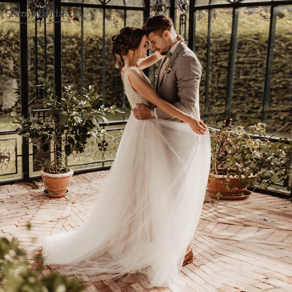 ลึกVคอชุดแต่งงานกระโปรงTulleลูกไม้Appliques Bohemianชุดเจ้าสาวBackless Beach Vestido De Noivas DW438