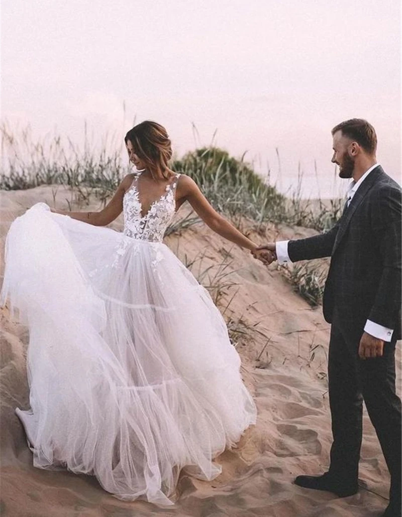 Abiti da sposa romantici della boemia abiti da sposa senza maniche in pizzo con scollo a v e fiori