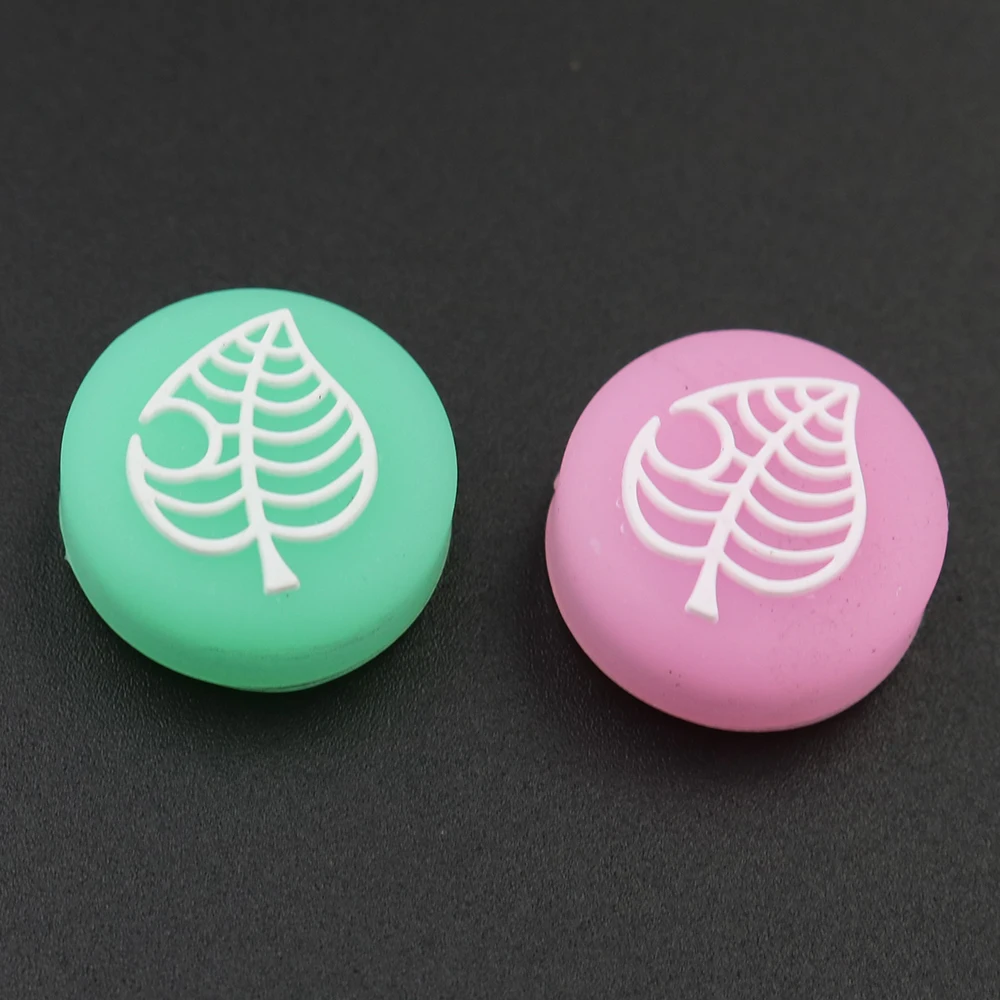 Joystick de silicona con forma de hoja luminosa para cruce de animales, tapas de agarre para pulgar de oso y hoja de árbol para controlador Nintendo Switch Lite