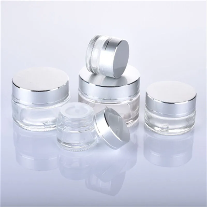 

10pcs/lot 5G 10G 15G 20G 30G 50G 100G clear Glass Cream Jar Cosmetic Container Cosmetic Jars Silver Lid Glass Bottle