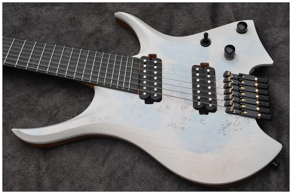 2020 New Fanned frets 7 Strings Headless Electric Guitar White Eye Poplar 5-ply Roasted Maple Neck Ergonomic New bridge