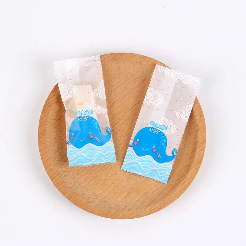 100pcs Nougat Plastic Bag Cartoon Cute Whale Waves Clouds Decor Handmade Gift Candy Wrapper Baptism Sugar Machine Seal Packaging