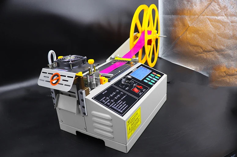 988T Automatic tape cutting machine by computer hot and cold cutting machine elastic tape cutting machine 110V / 220V 400W