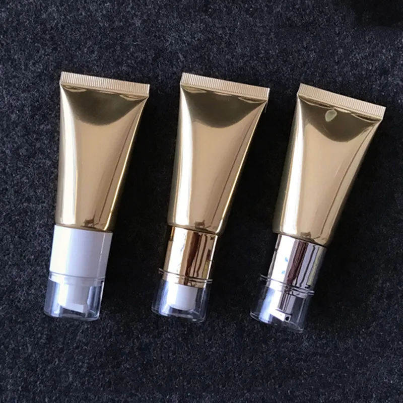 

Wholesale New 30ml cosmetic Soft Tubes Vacuum pump squeeze Hose Bottles Gold Alum Eye Cream Bottles sunscreen Refilable Bottles