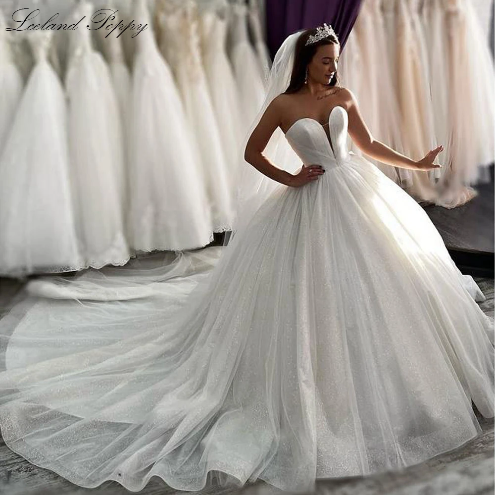 

Lceland Poppy Ball Gown Strapless Wedding Dresses Sleeveless Pleated Tulle Vestido de Novia Shiny Bridal Gowns Chapel Train