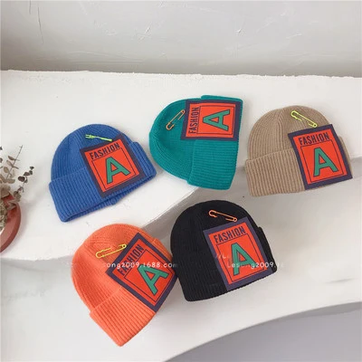 Hip hop trendy children's knitted pullover Hat Pin letter cloth label  baby wool hat warm and cold hat