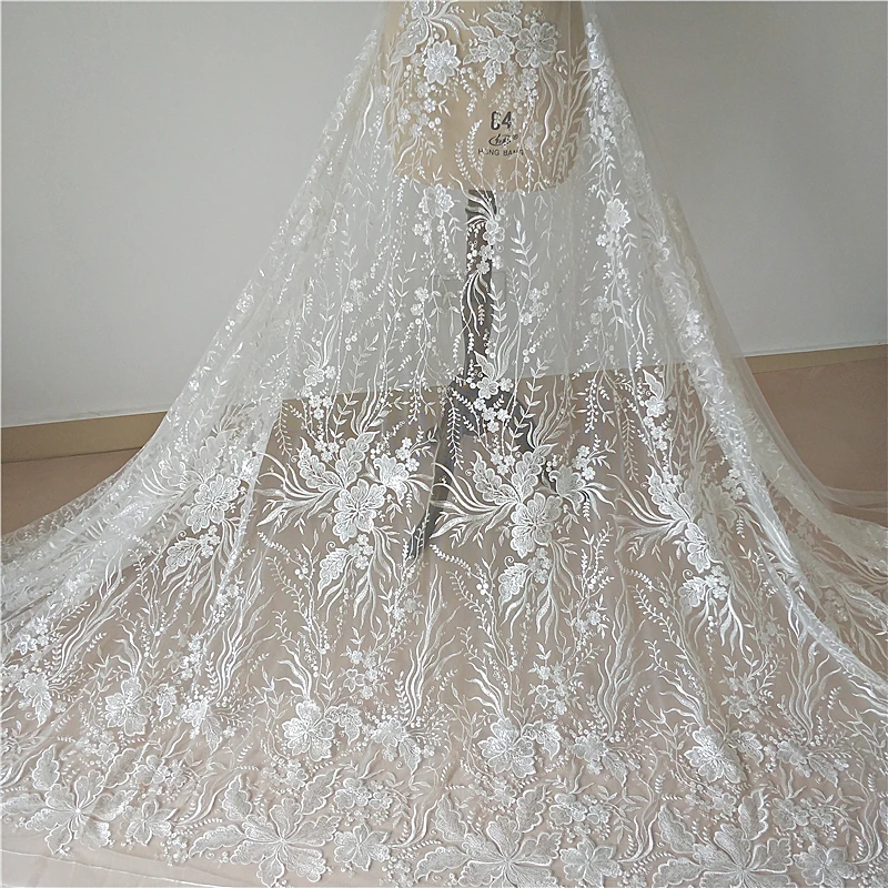 New high-end wedding dress lace fabric milky white sequins seaweed flower embroidery mesh fabric