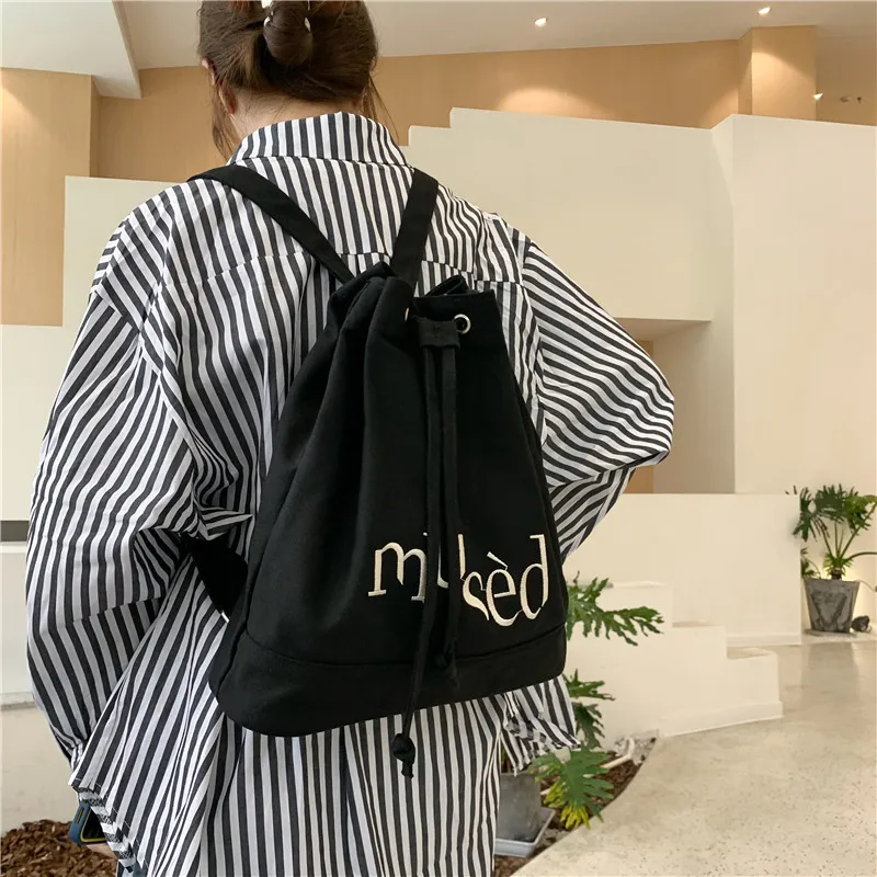 CGCBAG Korean Fashion Canvas Women Backpack 2022 Simple Letter Printing Backpack Female Retro Drawcord School Bag Designer Bag